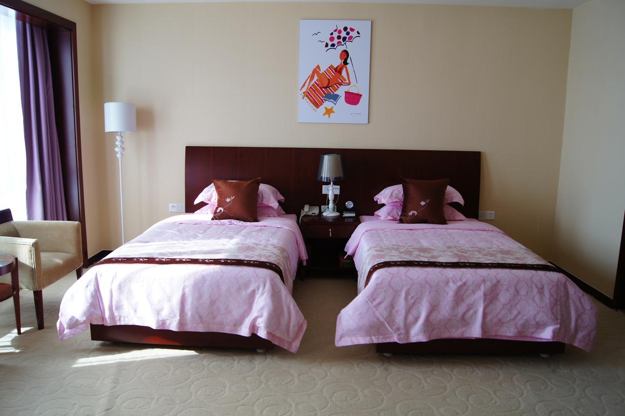 Fuxing Oriental Boutique Hotel Chifeng Room photo