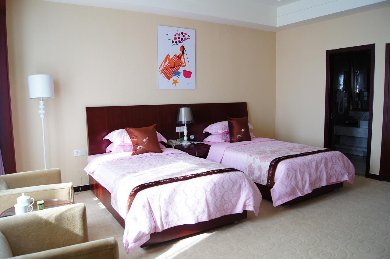 Fuxing Oriental Boutique Hotel Chifeng Room photo