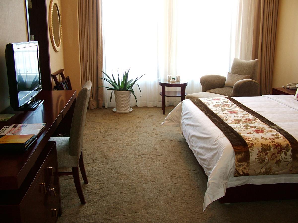 Fuxing Oriental Boutique Hotel Chifeng Room photo