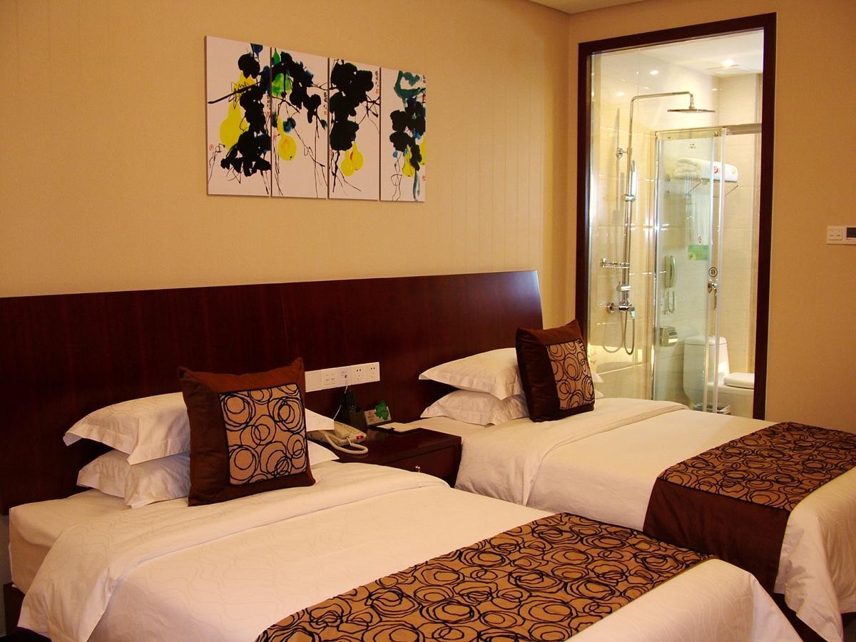 Fuxing Oriental Boutique Hotel Chifeng Room photo