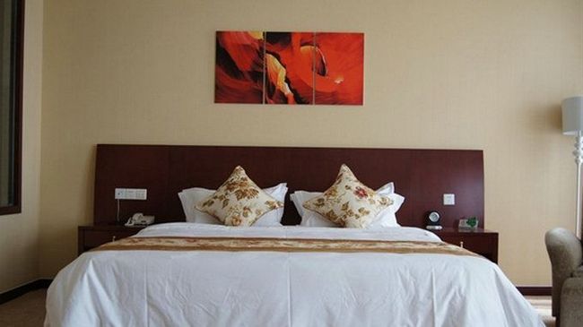 Fuxing Oriental Boutique Hotel Chifeng Room photo